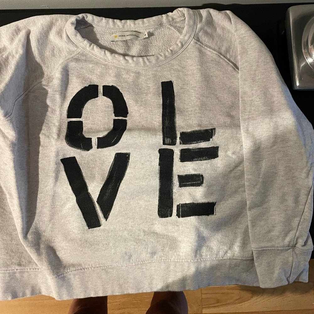 Kerry Rosenthal super cute OLVE sweatshirt.
